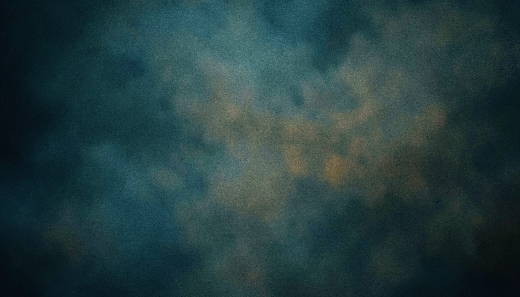 Muted teal and warm brass highlights blending into a smoky gradient